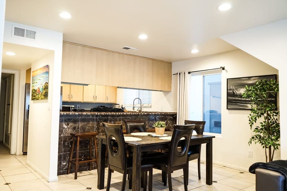 Dinning table for 4 and kitchen bar, which seats and additional 4.