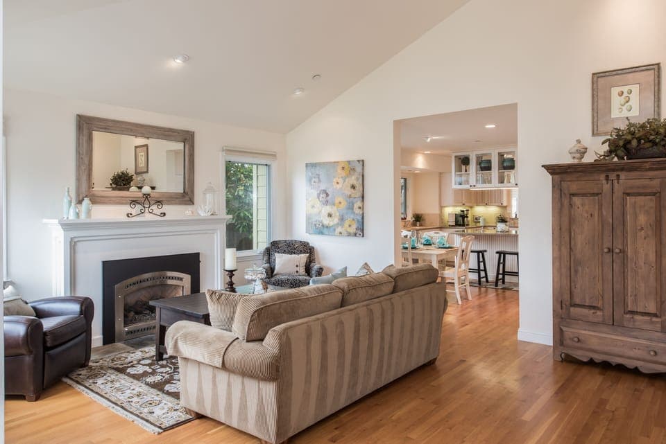 The living room has vaulted ceilings and a gas fireplace.  