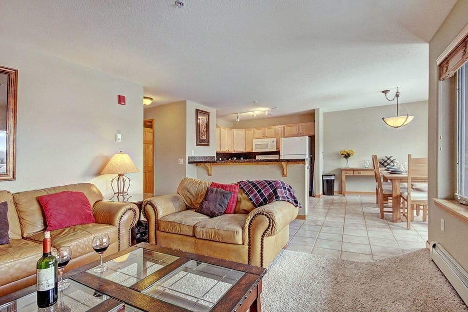 Open concept living and kitchen area, dining area on the right