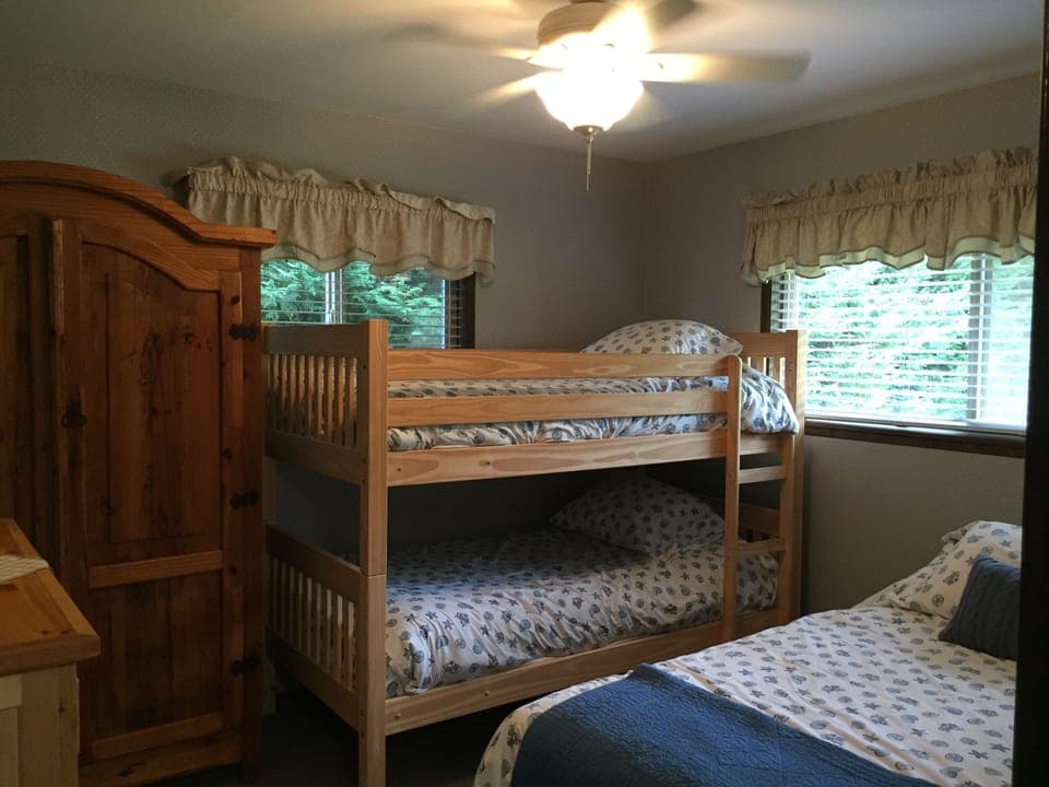 Bedroom with bunk beds and queen
