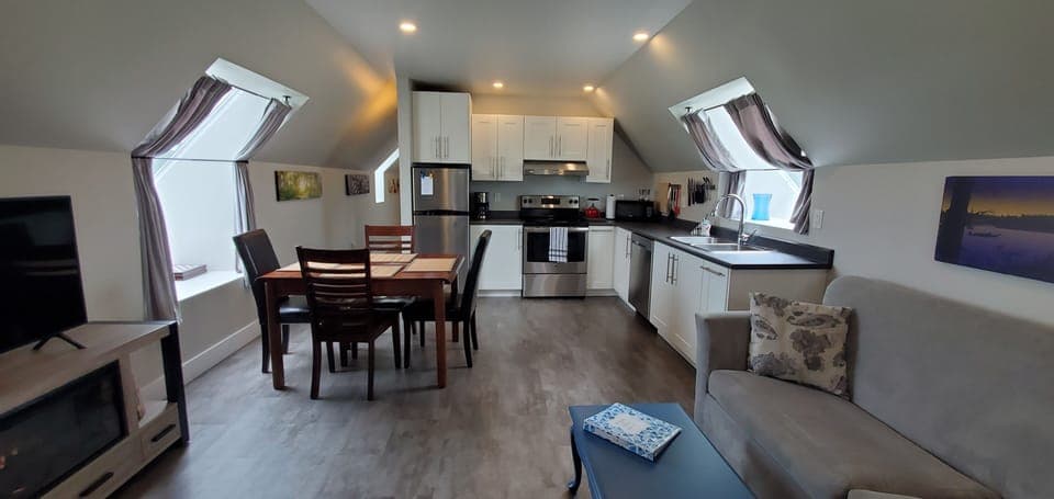 The open living area and fully equipped kitchen - includes all dishes, pots, etc