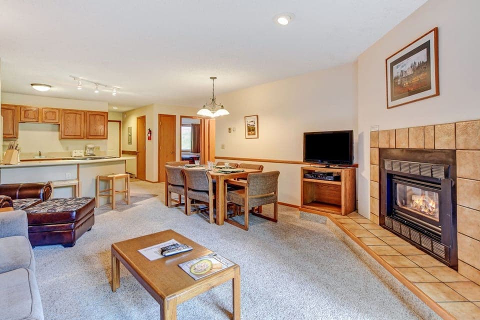 View of open floor plan living room, dining room, and kitchen 