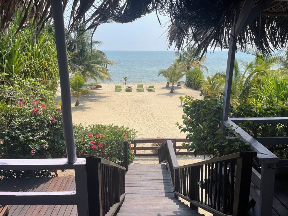 Stairs down from the balcony to private beach