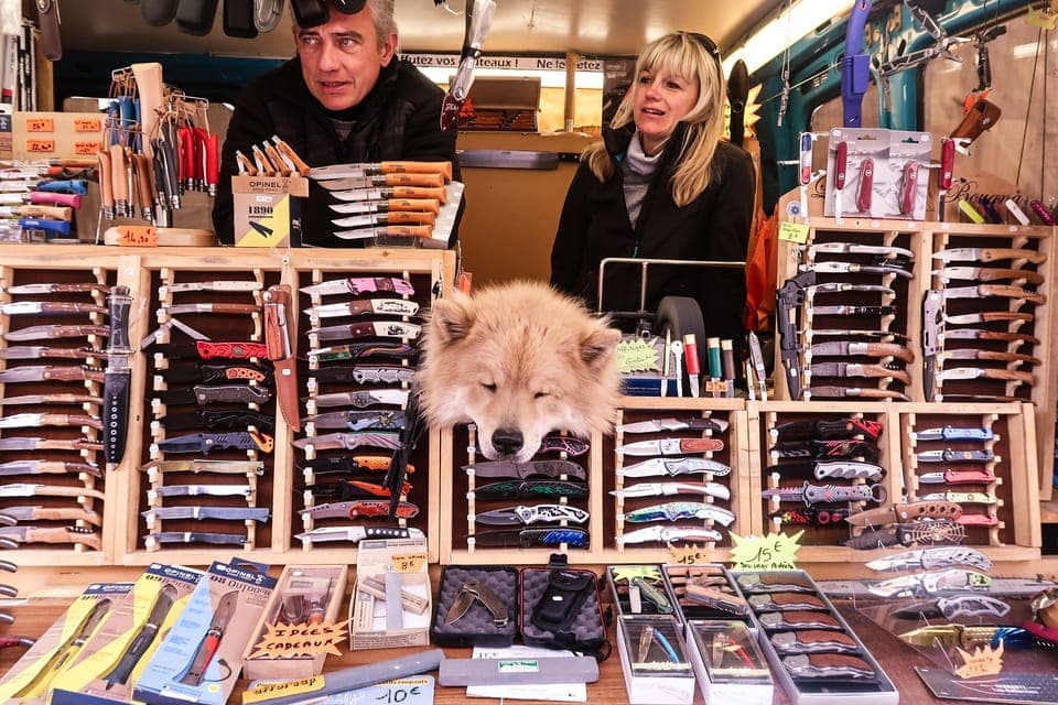 New friends at the morning markets...never fear, the knives are scarier than he is...