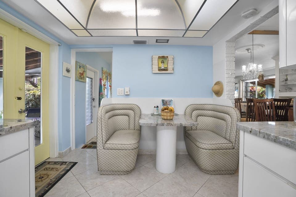 Eat-in kitchen connects directly to the patio and the laundry room. 