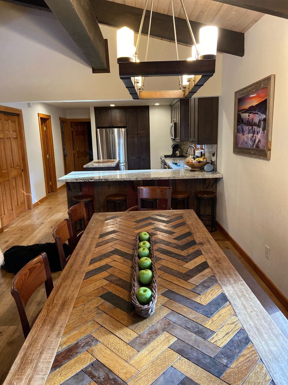 Large dinning table seats 10-12.   5 Counter bar stools.