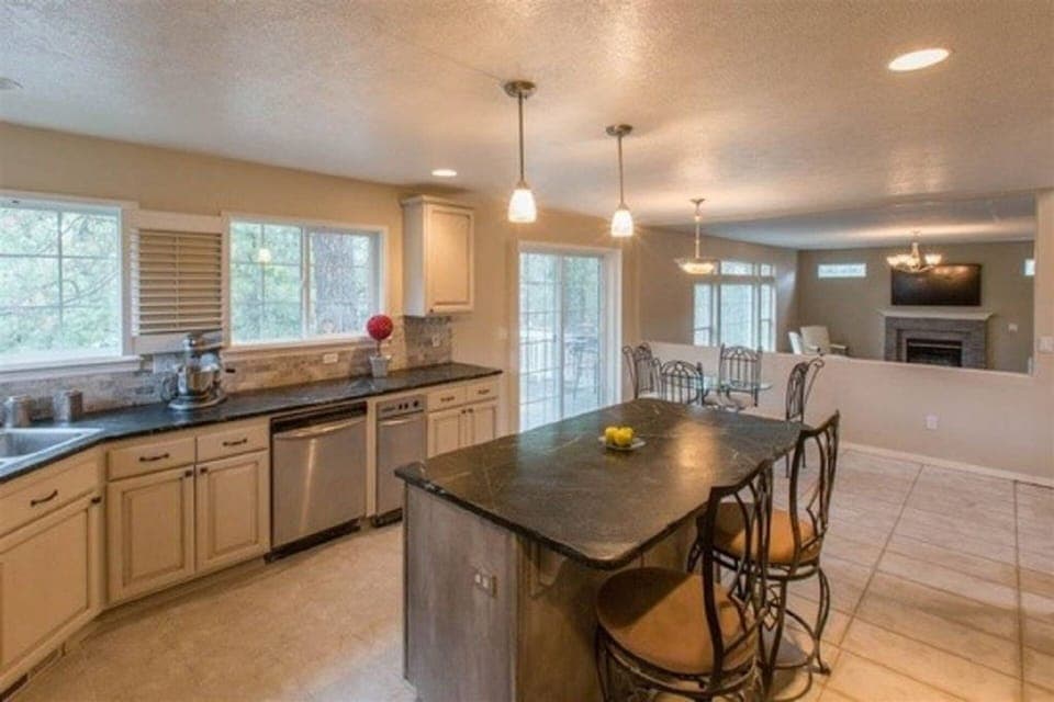 Gourmet Kitchen w/2 Double Ovens, Over Sized Gas Cook top &SoapStone counter top