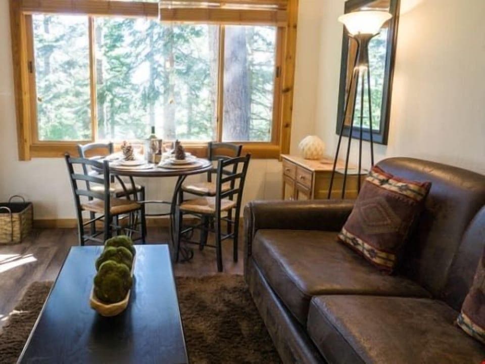 Kick back your feet and relax in the spacious, bright living room.