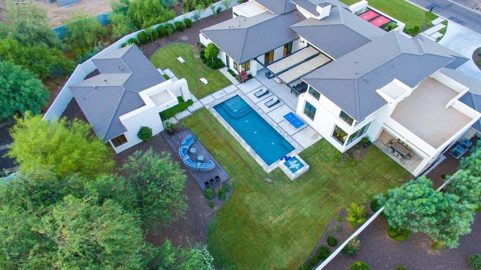 Birds eye view of this gorgeous estate & amenity full yard w/ pool, spa, & games