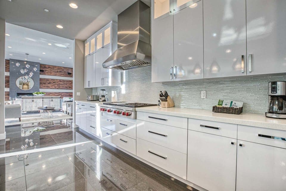 Plenty of counter space in this modern kitchen w/ large gas range & cooktop