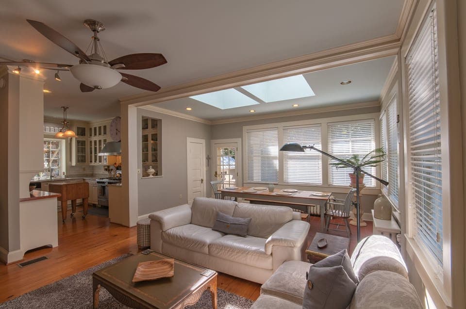 Family room with large screen TV and plenty of seating