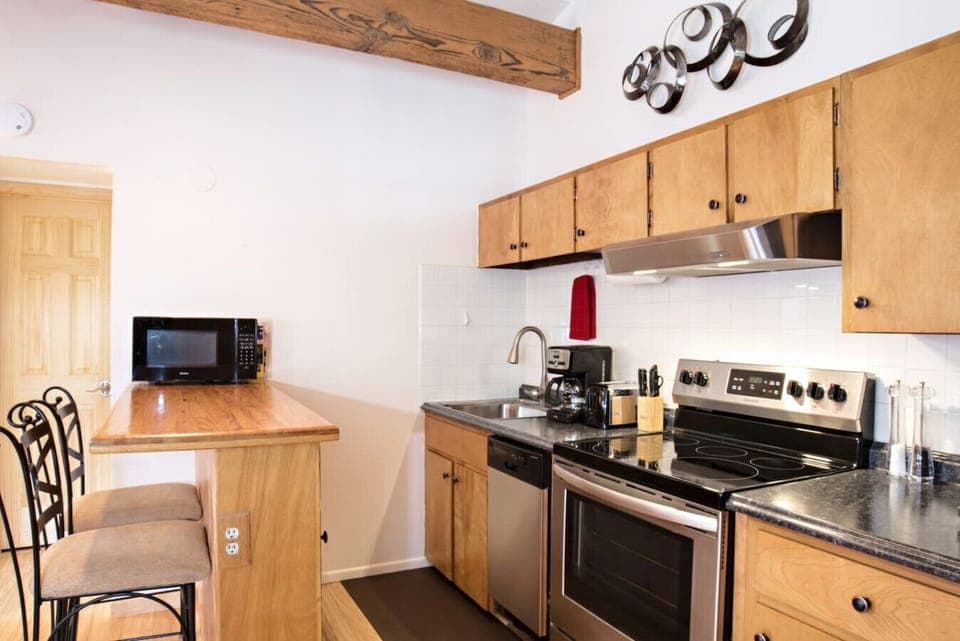 Kitchen with stainless steel appliances