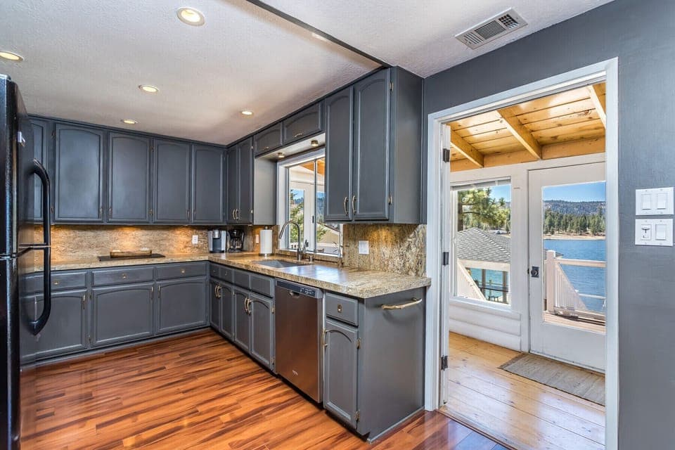 Fully stocked kitchen with lake view.