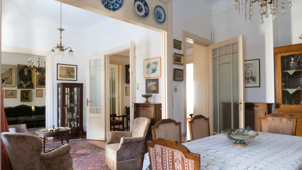 The apartment is full of original decor and features