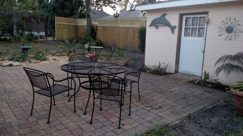 Laundry shed, patio furniture for outdoor cocktails and dining