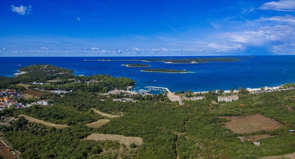 Beautiful view from the air on the city and National Park Brijuni