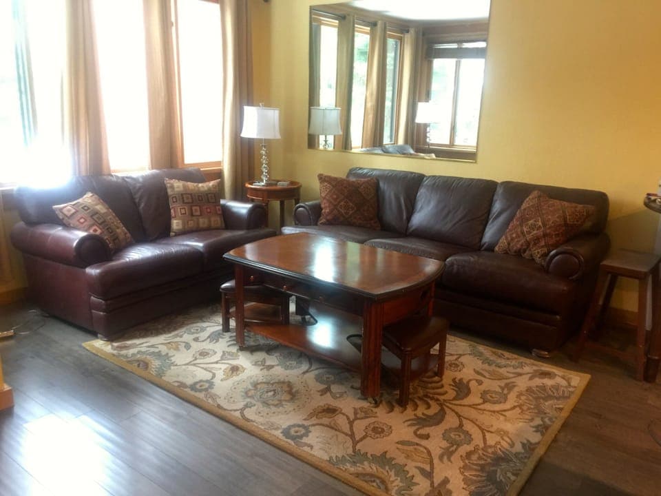 Living Room with Sofa Bed and Foosball Table