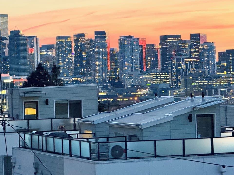 Downtown Seattle Skyline at sunset photo taken from top balcony.