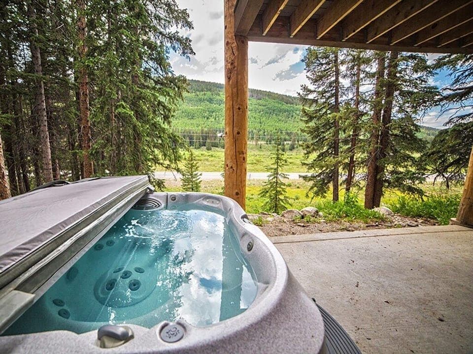Private hot tub on basement walkout patio