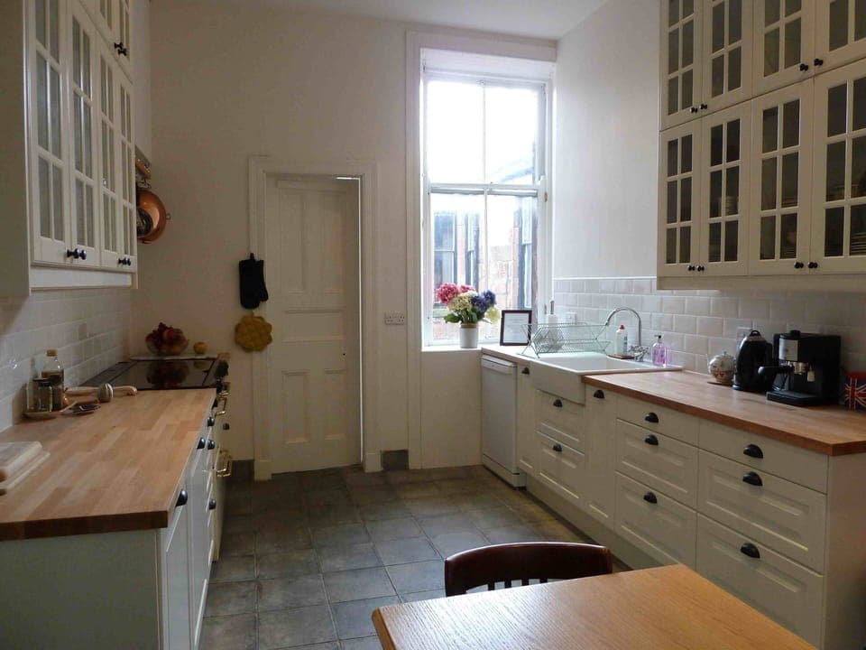 Spacious well stocked chef's kitchen 