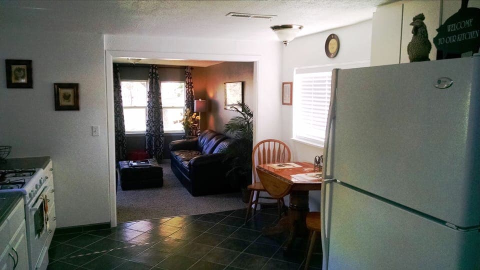 Kitchen looking into Living Room.  Lots of natural light.
