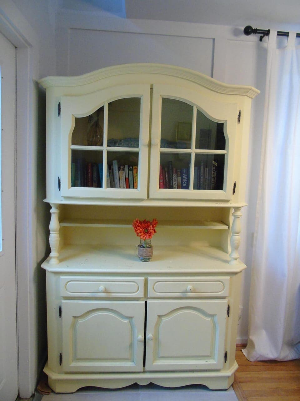 Entry level cabinet, stocked with books and games to enjoy during your stay