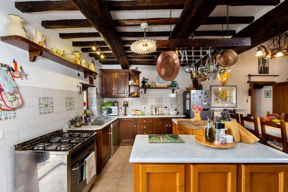 Kitchen with a host of appliances.