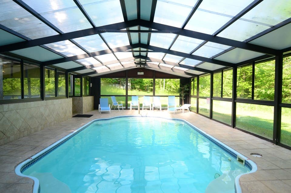 "greenhouse" become almost one with nature as yo enjoy the pool
