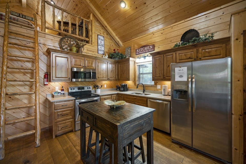 The kitchen may be small, but it has full size appliances and everything you need to cook up great meals!