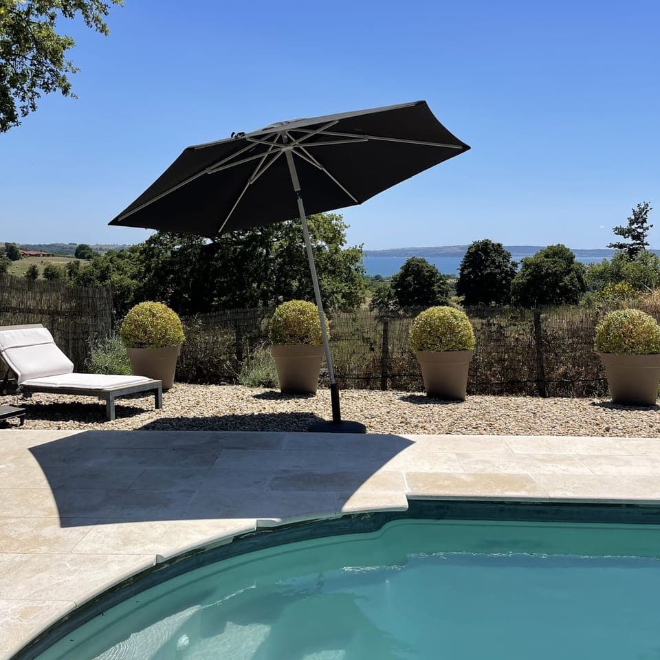 Pool with view, sunbeds, pergola, umbrellas
