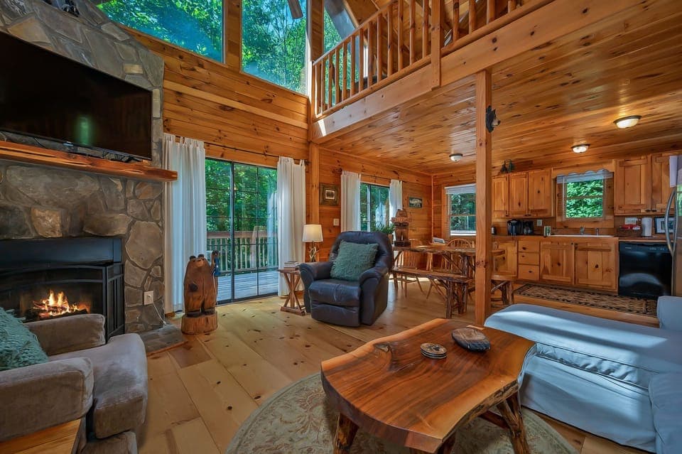 Large 3 story log home. Open living room.
