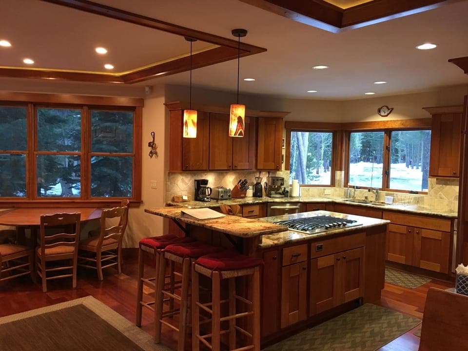 Large Kitchen and island to enjoy cooking and hanging together. Cherry cabinets.