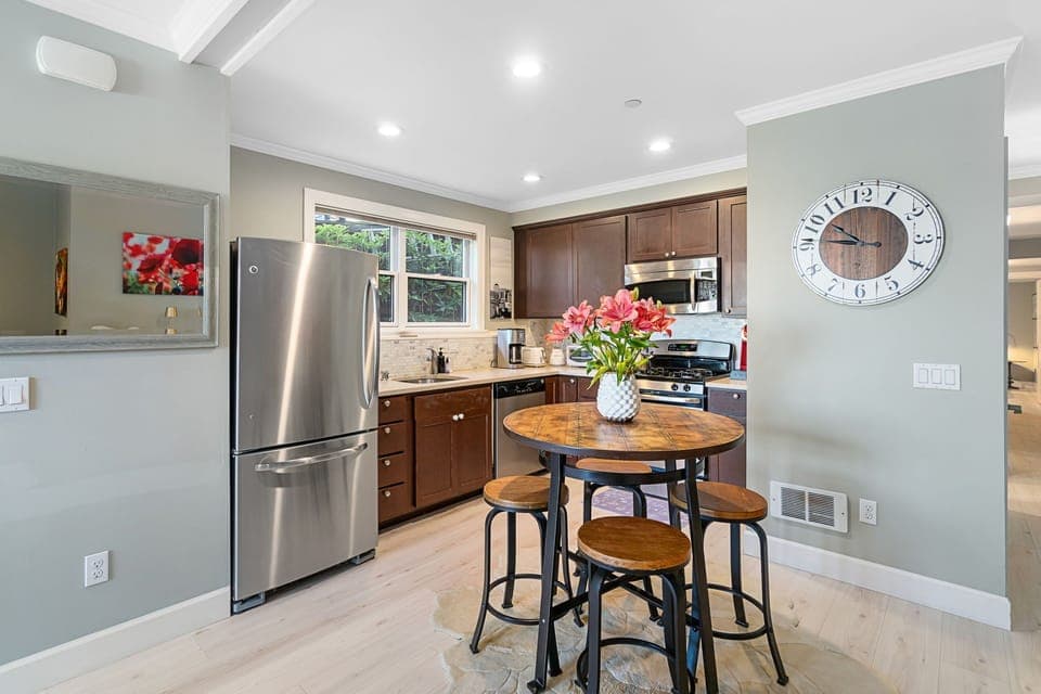 Full kitchen and dining for four. 