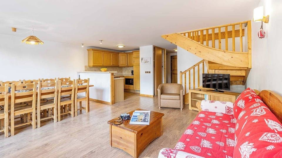 Relax on the sofa after a day in the mountains - this unit may be a duplex!