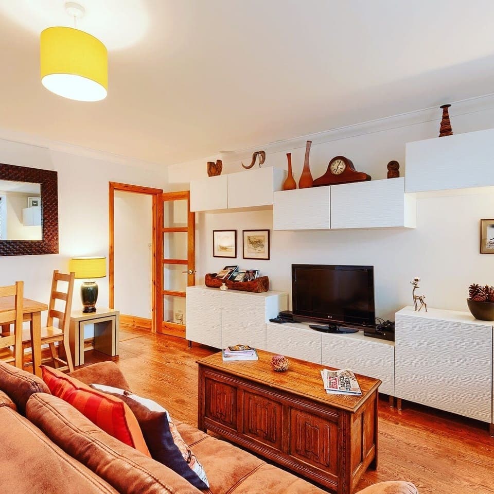 Large, bright lounge with dining area