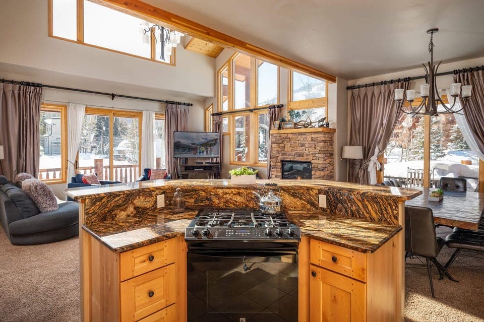 View into the main living area and dining area from the kitchen