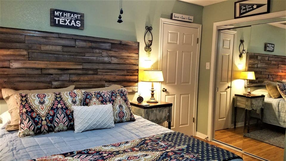 Master with half bath and custom made headboard, huge closet with mirrors