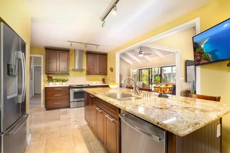 Chef's Kitchen is well stocked. Island seating, 2 prep areas, 2 dishwashers, TV.