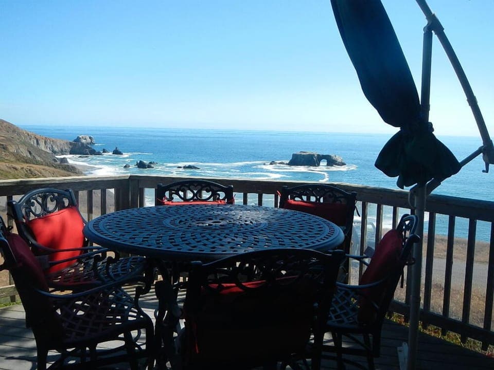 View of Arch Rock taken from front deck and kitchen door.  Bar-height seating.