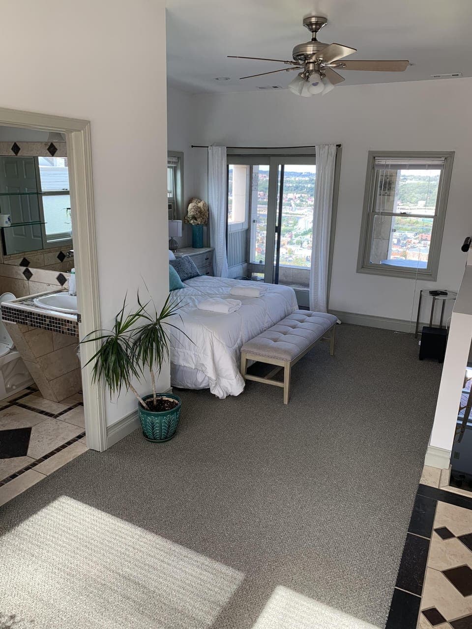 Master suite with private full bath and balcony overlooking Southside and city!