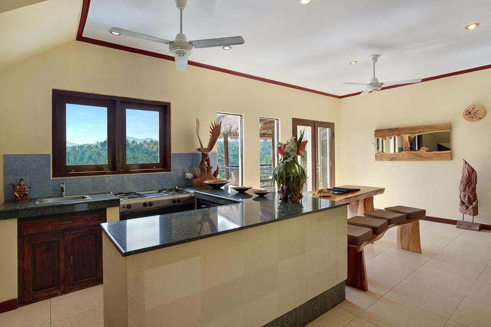 The living room / kitchen has everything you need, including stove and micro wave. 