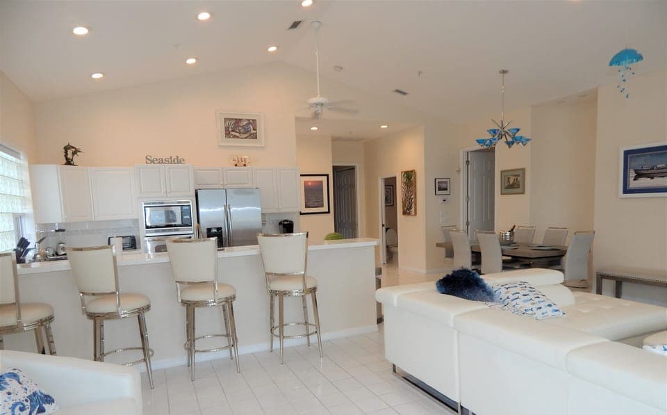 Upper Level: Kitchen, Living and Dining Rooms.