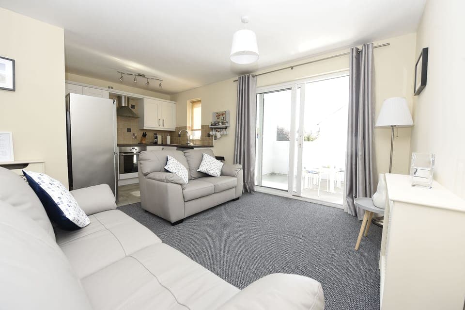 The living area leads to the south facing balcony.
