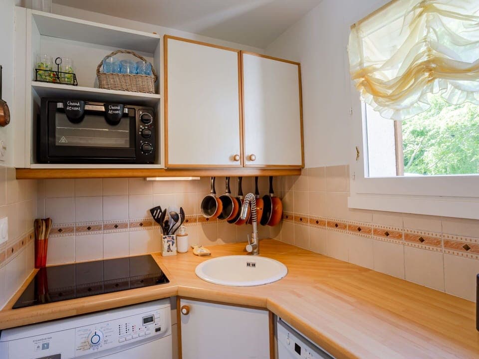 Kitchen, Countertop, Interior Design, Kitchen Appliance, Wood, Major Appliance, Cabinetry, Kitchen Sink, Flooring, Plumbing Fixture