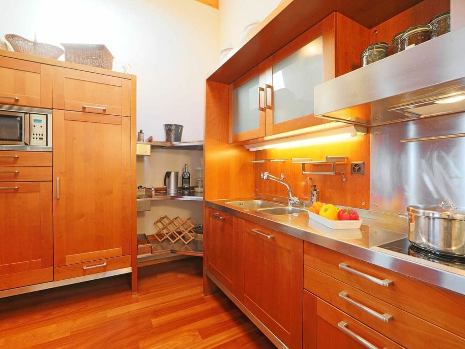 Countertop, Cabinetry, Building, Property, Furniture, Drawer, Kitchen Appliance, Kitchen, Kitchen Stove, Wood