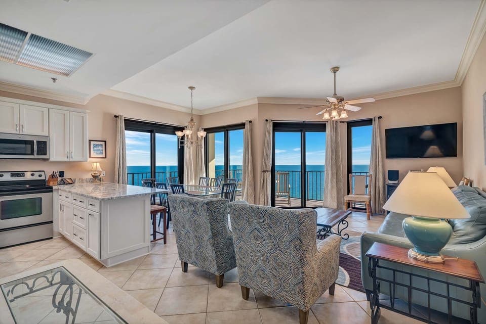 Open Plan Living Area with floor to ceiling windows, a queen size sleeper sofa overlooking the Gulf of Mexico