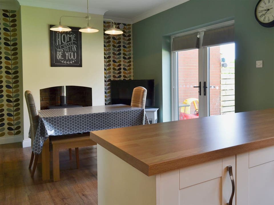 Kitchen and dining room with breakfast area | Apple Tree House, Scarborough
