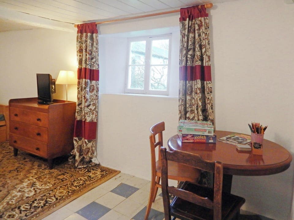 Intimate dining area | Tutchenor Farmhouse, Patchacott, near Beaworthy