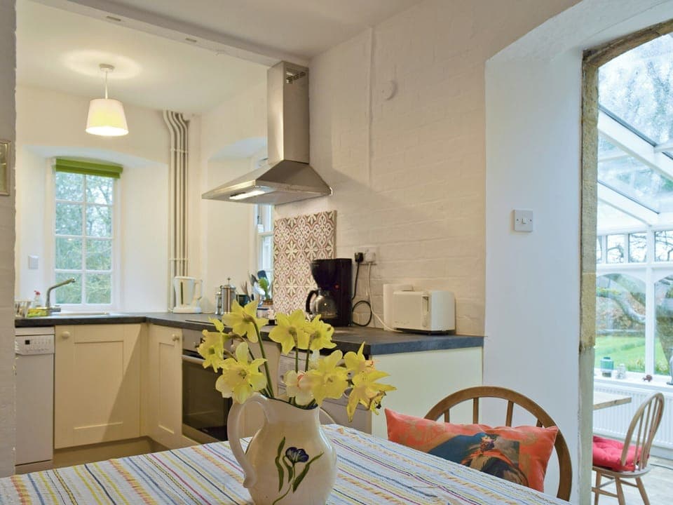 Informal dining space in the kitchen | Jubilee Cottage, Church Enstone, near Chipping Norton