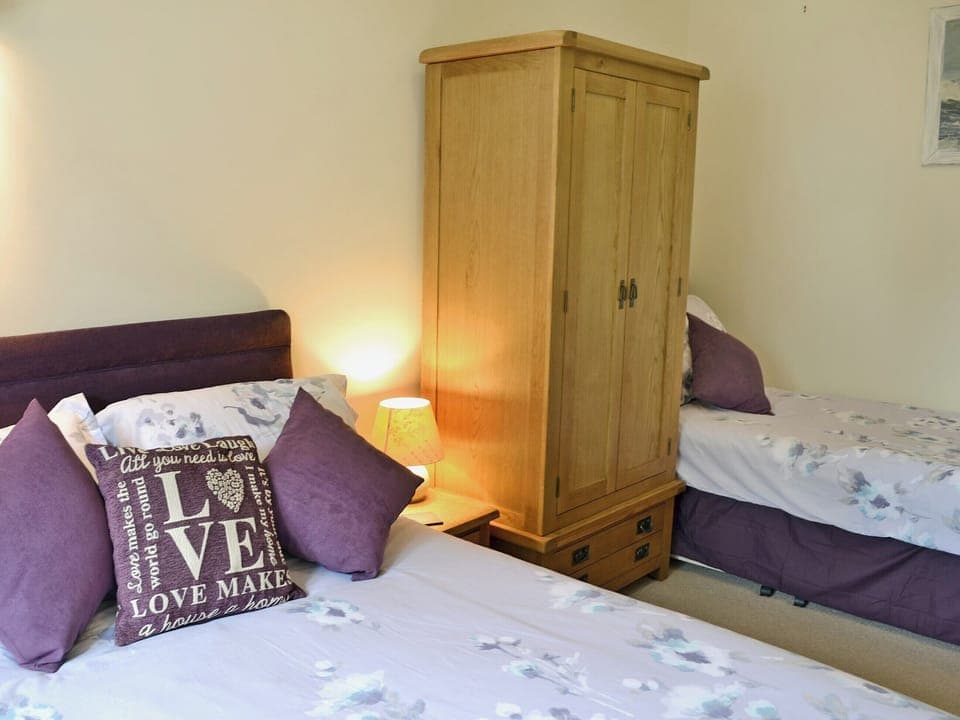 Comfortable bedroom with double bed and single bed | Blackthorn Cottage, Swan Pool, near Falmouth